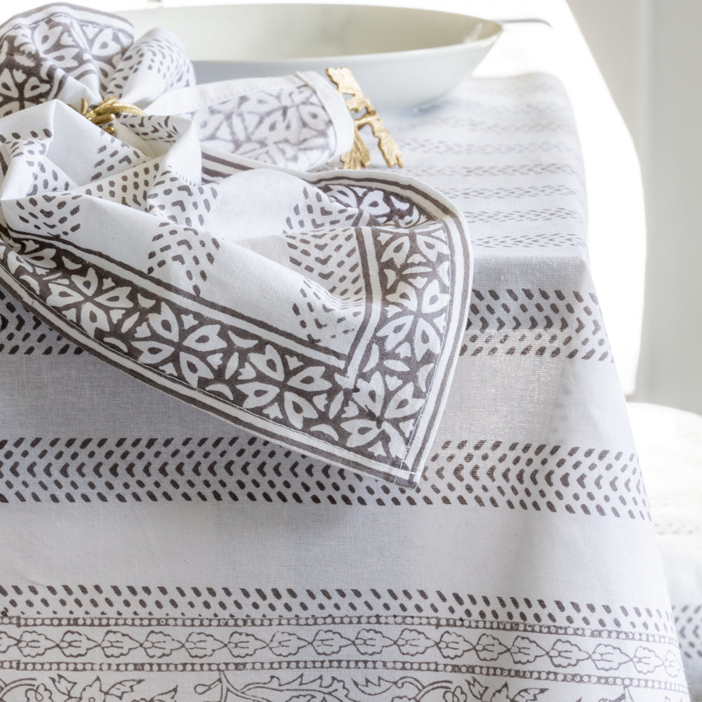 Close up detail of 100% cotton hand block printed table cloth with pretty grey pattern detail. Perfect for pretty indoor table settings and outdoor al fesco dining. Rectangular, 100% cotton Size: 230cm x 140cm | Spring tablecloth | Summer tablecloth | 100% cotton tablecloth | Little Wren Interiors