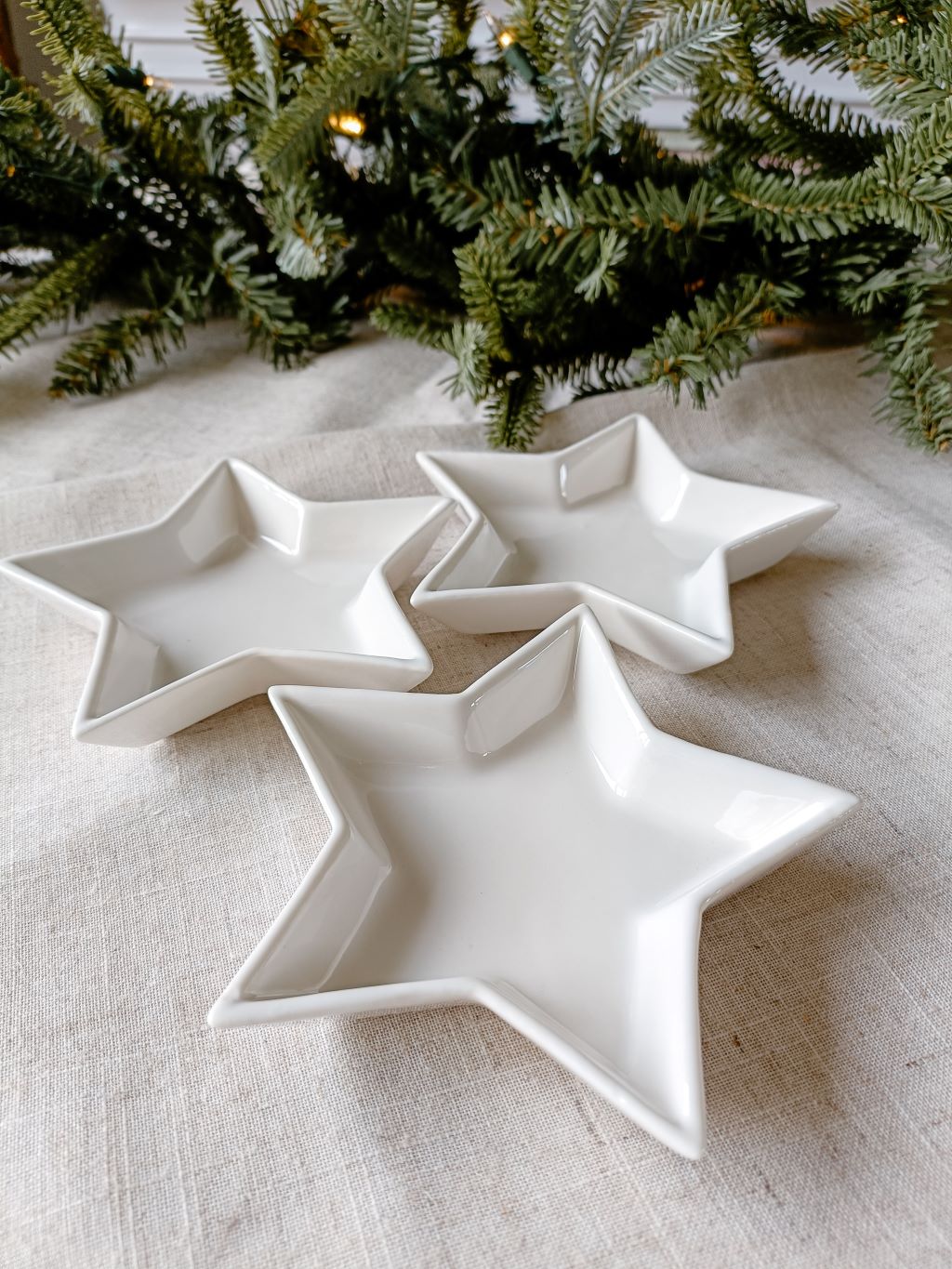 Close up angle to show depth of white star shaped trinket dishes